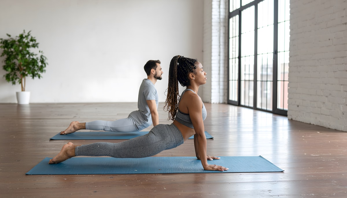 Woman performing yoga flexibility pose